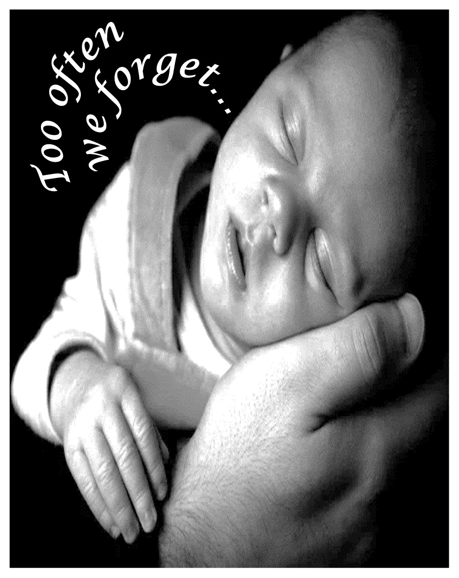 Man Holding Baby-Tangible